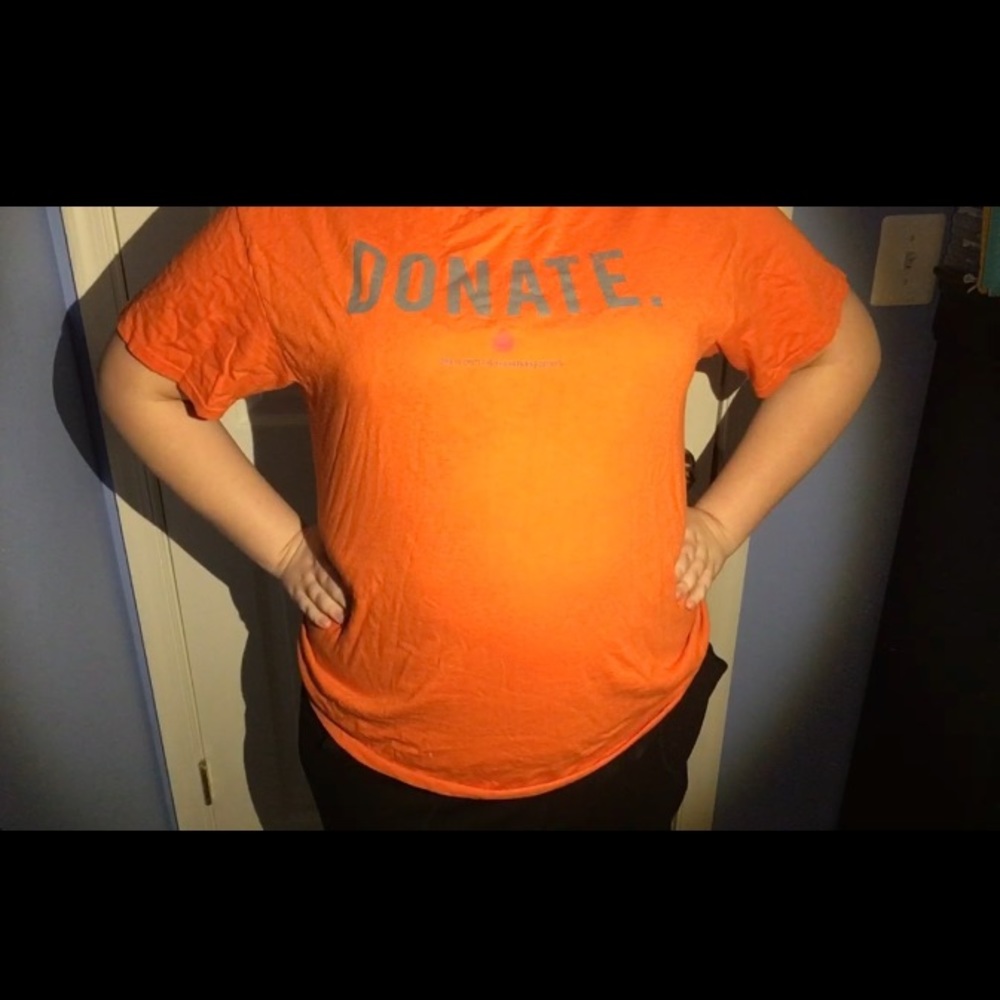 Unisex orange donation shirt